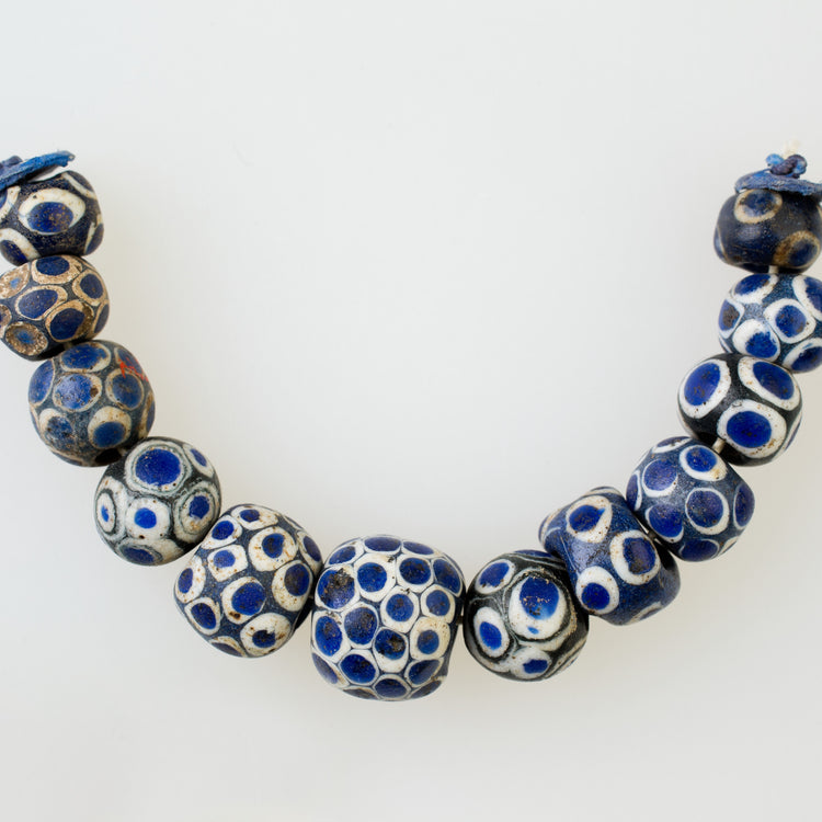 String of 12 Eye Beads