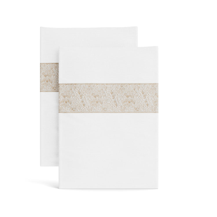 Stacked white Minaudiere pillowcases from the Judith Leiber Couture x Ann Gish collection, detailed with a pumice sequined border band that echoes the jeweled Minaudiere motif. - PCMIK‑WHI‑PUM PCMIS‑WHI‑PUM