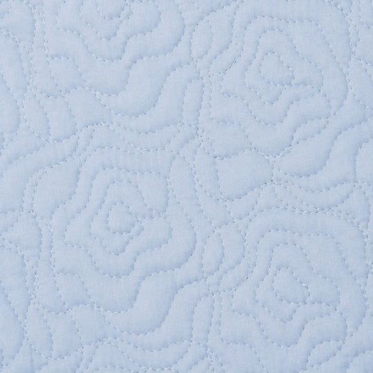 Swatch of the Roses Coverlet Set in Blue from the Judith Leiber Couture by Ann Gish collection, showing the rose quilted pattern and texture. - YSETCORQK-BLE YSETCORQQ-BLE