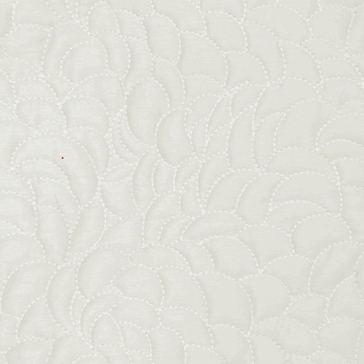 Swatch of the Shells Coverlet Set in Bone from the Judith Leiber Couture by Ann Gish collection, showing the scalloped quilted pattern and texture.
